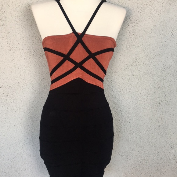 bebe Dresses & Skirts - STRAPPY BANDAGE DRESS SEXY
